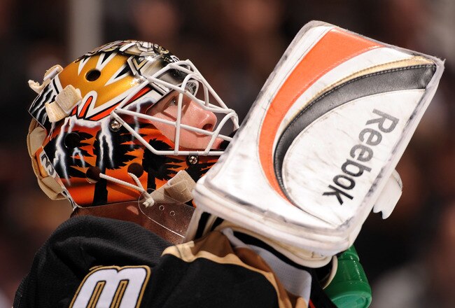 ANAHEIM, CA - NOVEMBER 24:  Jean-Sebastian Giguere #35 of the Anaheim Ducks takes a break in goal against the Colorado Avalanche during the second period at the Honda Center on November 24, 2008 in Anaheim, California.  (Photo by Harry How/Getty Images)