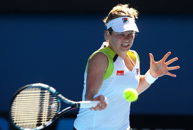 MELBOURNE, AUSTRALIA - JANUARY 22:  Kim Clijsters of Belgium plays a forehand in her fourth round match against Na Li of China during day seven of the 2012 Australian Open at Melbourne Park on January 22, 2012 in Melbourne, Australia.  (Photo by Cameron Spencer/Getty Images)
