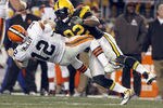 PITTSBURGH, PA - DECEMBER 8:   James Harrison #92 of the Pittsburgh Steelers tackles  Colt McCoy #12 of the Cleveland Browns during the game on December 8, 2011 at Heinz Field in Pittsburgh, Pennsylvania.  The Steelers won 14-3.  (Photo by Justin K. Aller/Getty Images)