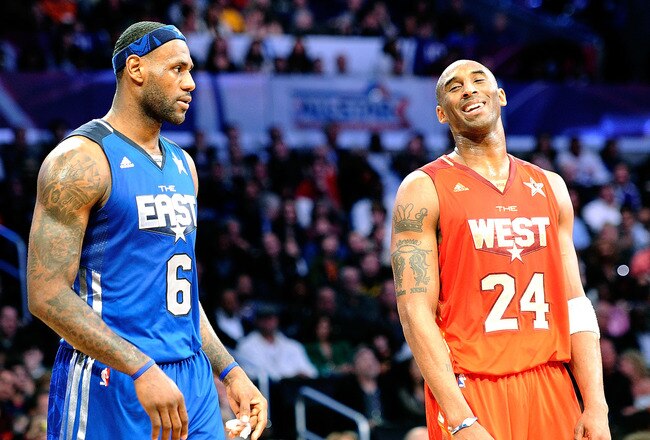LOS ANGELES, CA - FEBRUARY 20:  LeBron James #6 of the Miami Heat and the Eastern Conference stands with Kobe Bryant #24 of the Los Angeles Lakers and the Western Conference in the 2011 NBA All-Star Game at Staples Center on February 20, 2011 in Los Angeles, California. NOTE TO USER: User expressly acknowledges and agrees that, by downloading and or using this photograph, User is consenting to the terms and conditions of the Getty Images License Agreement.  (Photo by Kevork Djansezian/Getty Images)