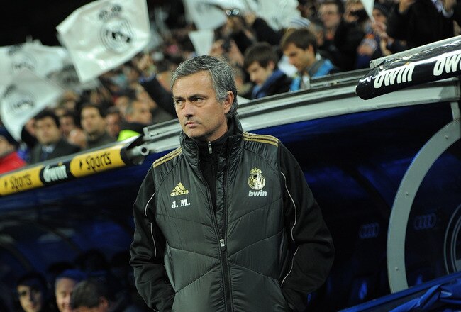 MADRID, SPAIN - JANUARY 18:  Head coach Jose Mourinho of Real Madrid waits for the start of the Copa del Rey quarter final match between Real Madrid and Barcelona at Estadio Santiago Bernabeu on January 18, 2012 in Madrid, Spain.  (Photo by Jasper Juinen/Getty Images)
