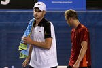 MELBOURNE, AUSTRALIA - JANUARY 19:  Andy Roddick (L) of the USA walks from the court after retiring in his second round match against Lleyton Hewitt of Australia during day four of the 2012 Australian Open at Melbourne Park on January 19, 2012 in Melbourne, Australia.  (Photo by Quinn Rooney/Getty Images)