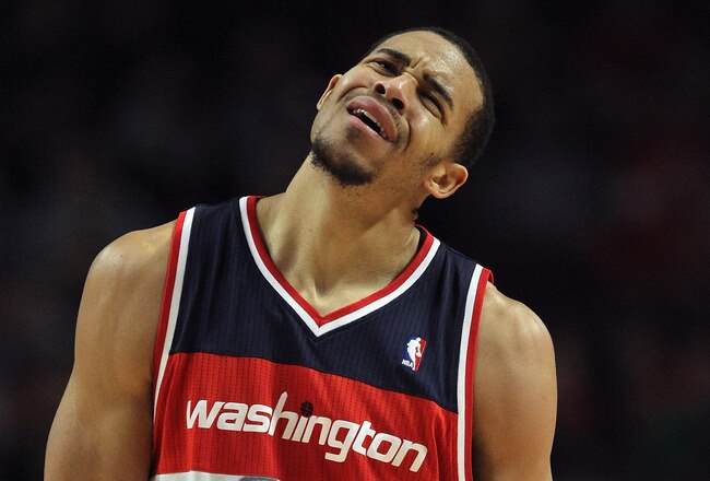 CHICAGO, IL - JANUARY 11: JaVale McGee #34 of the Washington Wizards reacts after being called for a foul against the Chicago Bulls at the United Center on January 11, 2012 in Chicago, Illinois. The Bulls defeated the Wizards 78-64. NOTE TO USER: User expressly acknowledges and agrees that, by downloading and or using this photograph, User is consenting to the terms and conditions of the Getty Images License Agreement. (Photo by Jonathan Daniel/Getty Images)