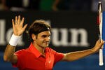MELBOURNE, AUSTRALIA - JANUARY 22:  Roger Federer of Switzerland thanks the crowd after winning his fourth round match against  Bernard Tomic of Australia during day seven of the 2012 Australian Open at Melbourne Park on January 22, 2012 in Melbourne, Australia.  (Photo by Mark Dadswell/Getty Images)
