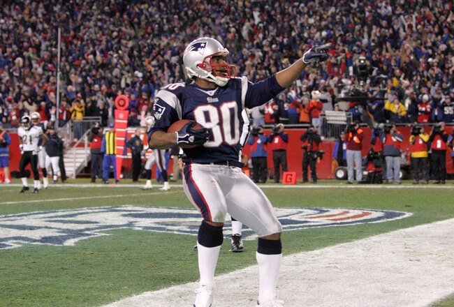 FOXBORO, MA - JANUARY 07:  Troy Brown #80 of the New England Patriots celebrates his second quarter touchdown against the Jacksonville Jaguars during their Wild Card Playoff game on January 7, 2006 at Gillette Stadium in Foxboro, Massachusetts.  (Photo by Jim McIsaac/Getty Images)
