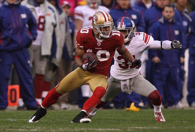SAN FRANCISCO, CA - JANUARY 22:  Kyle Williams #10 of the San Francisco 49ers
 runs the ball as Aaron Ross #31 of the New York Giants defends during the NFC Championship Game at Candlestick Park on January 22, 2012 in San Francisco, California.  (Photo by Ezra Shaw/Getty Images)