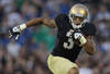 SOUTH BEND, IN - SEPTEMBER 03: Michael Floyd #3 of the Notre Dame Fighting Irish runs after catching a pass against the University of South Florida Bulls at Notre Dame Stadium on September 3, 2011 in South Bend, Indiana. South Florida defeated Notre Dame 23-20. (Photo by Jonathan Daniel/Getty Images)