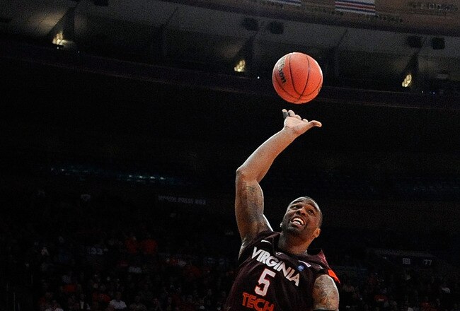 NEW YORK, NY - NOVEMBER 23:  Dorenzo Hudson #5 of the Virginia Tech Hokies drives the basket against Kris Joseph #32 of the Syracuse Orange during the 2011 Dick's Sporting Goods NIT Season Tip-Off at Madison Square Garden on November 23, 2011 in New York City.  (Photo by Patrick McDermott/Getty Images)