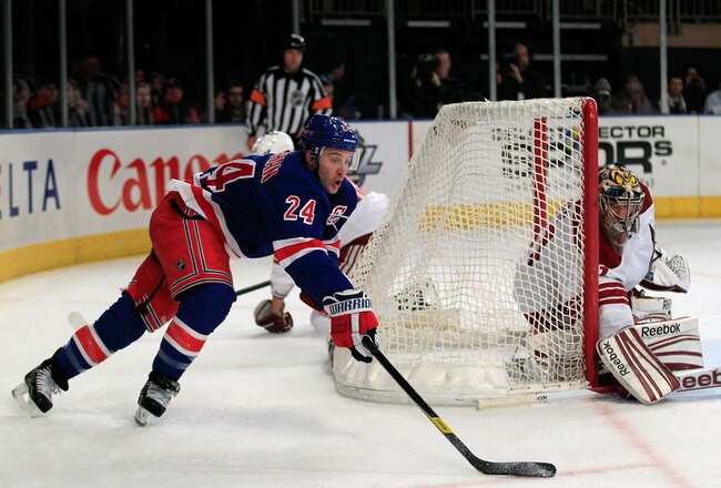 NEW YORK, NY - JANUARY 10:  (L) Ryan Callahan #24 of the New York Rangers prepares to shoot against (R) Mike Smith #41 of the Phoenix Coyotes at Madison Square Garden on January 10, 2012 in New York City.  (Photo by Chris Trotman/Getty Images)