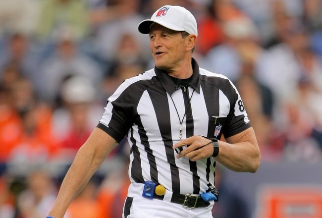 DENVER - AUGUST 30:  Referee Ed Hochuli oversees the action between the Denver Broncos and the Chicago Bears during preseason NFL action at INVESCO Field at Mile High on August 30, 2009 in Denver, Colorado. The Bears defeated the Broncos 27-17.  (Photo by Doug Pensinger/Getty Images)