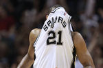 SAN ANTONIO, TX - APRIL 27:  Tim Duncan #21 of the San Antionio Spurs covers his face with his jersey after making a basket against the Memphis Grizzlies in Game Five of the Western Conference Quarterfinals in the 2011 NBA Playoffs on April 27, 2011 at AT&T Center in San Antonio, Texas. NOTE TO USER: User expressly acknowledges and agrees that, by downloading and or using this photograph, User is consenting to the terms and conditions of the Getty Images License Agreement.  (Photo by Jed Jacobsohn/Getty Images)