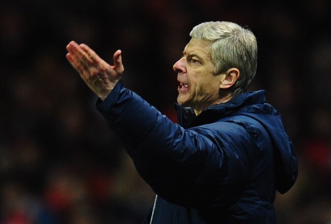 LONDON, ENGLAND - JANUARY 22:  Arsene Wenger manager of Arsenal reacts during the Barclays Premier League match between Arsenal and Manchester United at Emirates Stadium on January 22, 2012 in London, England.  (Photo by Mike Hewitt/Getty Images)