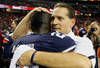 ATLANTA, GA - DECEMBER 31:  Head coach Gene Chizik of the Auburn Tigers celebrates with Onterio McCalebb #23 after their 43-24 win over the Virginia Cavaliers during the 2011 Chick Fil-A Bowl at Georgia Dome on December 31, 2011 in Atlanta, Georgia.  (Photo by Kevin C. Cox/Getty Images)