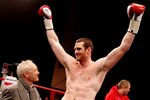 LIVERPOOL, ENGLAND - JANUARY 21:  David Price celebrates after his victory over John McDermott with Frank Maloney (L) during their British and Commonwealth Heavyweight Title Eliminator at Liverpool Olympia on January 21, 2012 in Liverpool, England.  (Photo by Scott Heavey/Getty Images)