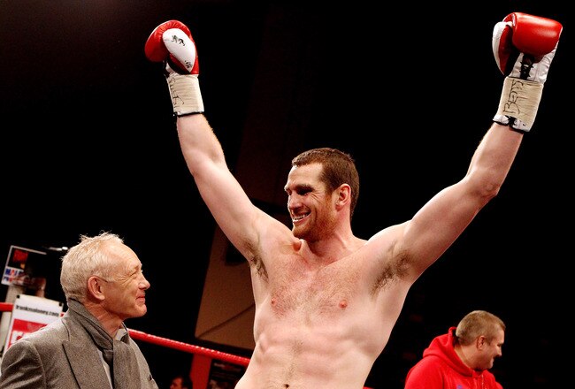 LIVERPOOL, ENGLAND - JANUARY 21:  David Price celebrates after his victory over John McDermott with Frank Maloney (L) during their British and Commonwealth Heavyweight Title Eliminator at Liverpool Olympia on January 21, 2012 in Liverpool, England.  (Photo by Scott Heavey/Getty Images)
