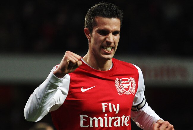 LONDON, ENGLAND - DECEMBER 31:  Robin van Persie of Arsenal celebrates scoring his 35th Premier League goal of the year during the Barclays Premier League match between Arsenal and Queens Park Rangers at the Emirates Stadium on December 31, 2011 in London, England.  (Photo by Clive Mason/Getty Images)