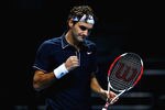 LONDON, ENGLAND - NOVEMBER 26:  Roger Federer of Switzerland celebrates a point during the men's singles round robin match against Juan Martin Del Potro of Argentina during the Barclays ATP World Tour Finals at the O2 Arena on November 26, 2009 in London, England  (Photo by Julian Finney/Getty Images)