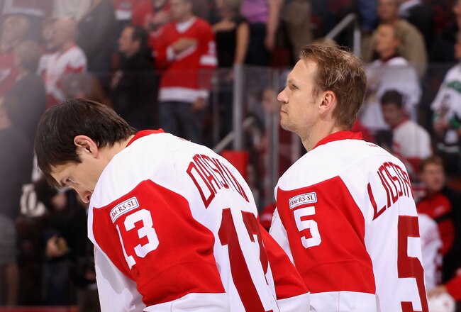 GLENDALE, AZ - JANUARY 19:  Pavel Datsyuk #13 and Nicklas Lidstrom #5 of the Detroit Red Wings stand attended for the National Anthem before the NHL game against the Phoenix Coyotes at Jobing.com Arena on January 19, 2011 in Glendale, Arizona. The Red Wings defeated the Coyotes 3-2 in an overtime shoot out.  (Photo by Christian Petersen/Getty Images)