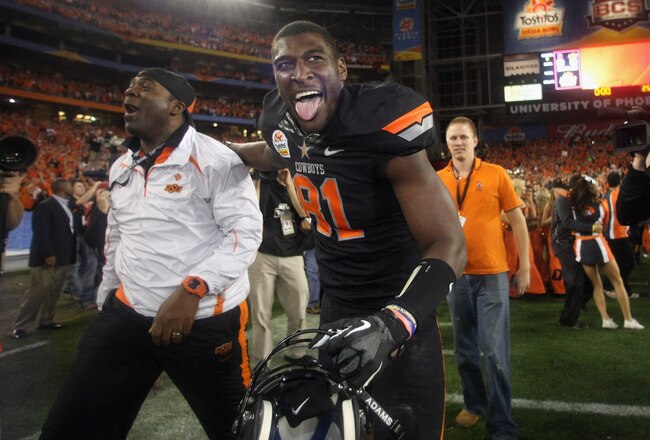 GLENDALE, AZ - JANUARY 02:  Justin Blackmon #81 of the Oklahoma State Cowboys celebrates after Oklahoma State Cowboys won 41-38 in overtime against the Stanford Cardinal during the Tostitos Fiesta Bowl on January 2, 2012 at University of Phoenix Stadium in Glendale, Arizona.  (Photo by Donald Miralle/Getty Images)