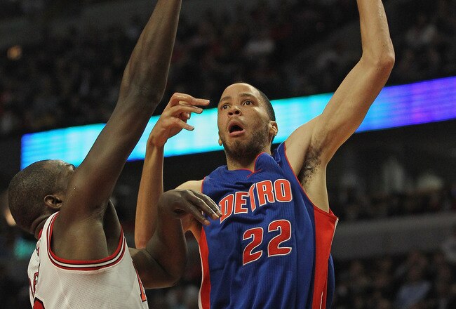 CHICAGO, IL - JANUARY 09: Tayshaun Prince #22 of the Detroit Pistons puts up a shot over Loul Deng #9 of the Chicago Bulls at the United Center on January 9, 2012 in Chicago, Illinois. NOTE TO USER: User expressly acknowledges and agrees that, by downloading and or using this photograph, User is consenting to the terms and conditions of the Getty Images License Agreement.  (Photo by Jonathan Daniel/Getty Images)