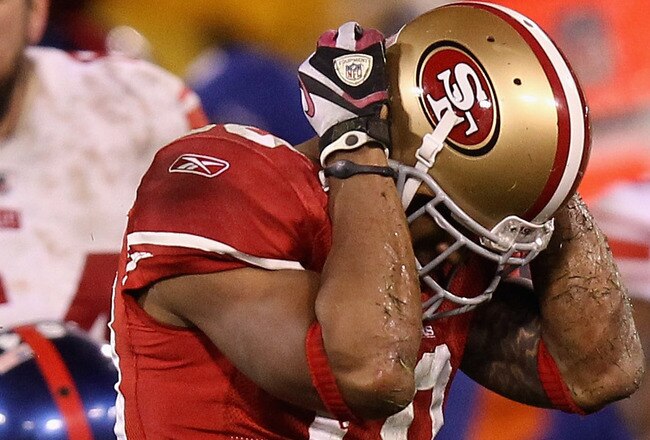 SAN FRANCISCO, CA - JANUARY 22:  Kyle Williams #10 of the San Francisco 49ers reacts after fumbling the ball in overtime of the NFC Championship Game against the New York Giants at Candlestick Park on January 22, 2012 in San Francisco, California. The Giants beat the 49ers 20-17 in overtime.  (Photo by Ezra Shaw/Getty Images)