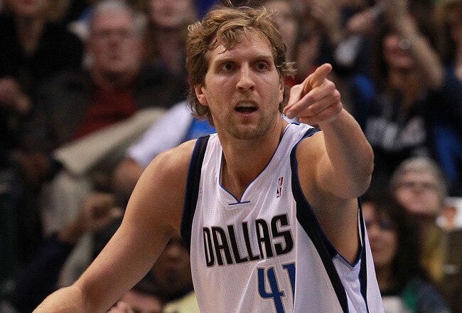 DALLAS, TX - JANUARY 04:  Dirk Nowitzki #41 of the Dallas Mavericks reacts after scoring against the Phoenix Suns at American Airlines Center on January 4, 2012 in Dallas, Texas. Nowitzki was playing in his 1,000 career game.  NOTE TO USER: User expressly acknowledges and agrees that, by downloading and/or using this Photograph, user is consenting to the terms and conditions of the Getty Images License Agreement.  (Photo by Ronald Martinez/Getty Images)