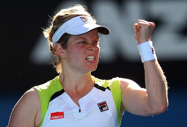 MELBOURNE, AUSTRALIA - JANUARY 22:  Kim Clijsters of Belgium celebrates winning a point in her fourth round match against Na Li of China during day seven of the 2012 Australian Open at Melbourne Park on January 22, 2012 in Melbourne, Australia.  (Photo by Cameron Spencer/Getty Images)