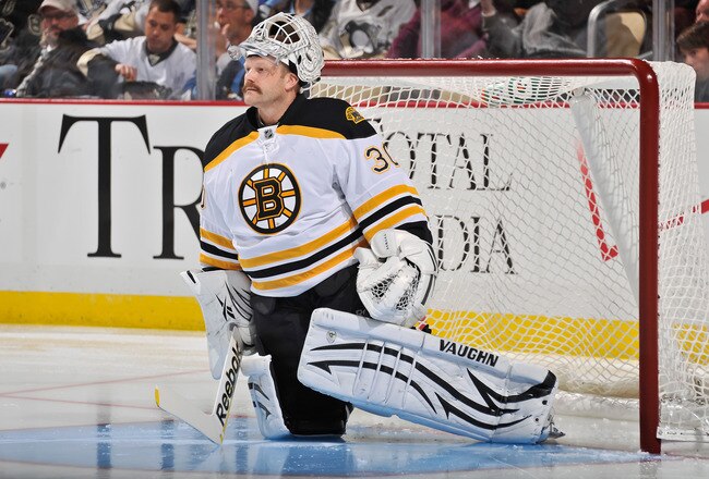 PITTSBURGH, PA - DECEMBER 5:  Goaltender Tim Thomas #30 of the Boston Bruins stretches before a game against the Pittsburgh Penguins on December 5, 2011 at CONSOL Energy Center in Pittsburgh, Pennsylvania.  (Photo by Jamie Sabau/Getty Images)