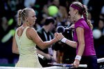 ISTANBUL, TURKEY - OCTOBER 27:  Caroline Wozniacki of Denmark congratulates Petra Kvitova of the Czech Republic after their match during round robin play of the TEB BNP Paribas WTA Championships Istanbul at the Sinan Erdem Dome on October 27, 2011 in Istanbul, Turkey.  (Photo by Matthew Stockman/Getty Images)