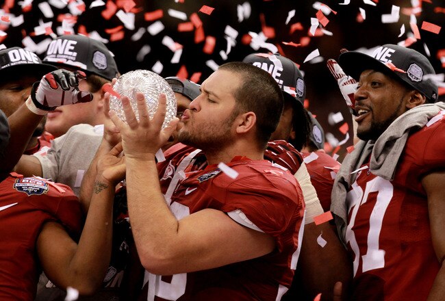 NEW ORLEANS, LA - JANUARY 09:  Nick Gentry #58 and the Alabama Crimson Tide celebrate after defeating Louisiana State University Tigers in the 2012 Allstate BCS National Championship Game at Mercedes-Benz Superdome on January 9, 2012 in New Orleans, Louisiana. Alabama  won the game by a score of 21-0.  (Photo by Ronald Martinez/Getty Images)