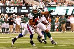EAST RUTHERFORD, NJ - NOVEMBER 27:  Dustin Keller #81 of the New York Jets scores a touchdown as  Justin Rogers #26 of the Buffalo Bills is late with the tackle during their game on November 27, 2011 at  MetLife Stadium in East Rutherford, New Jersey.  (Photo by Al Bello/Getty Images)
