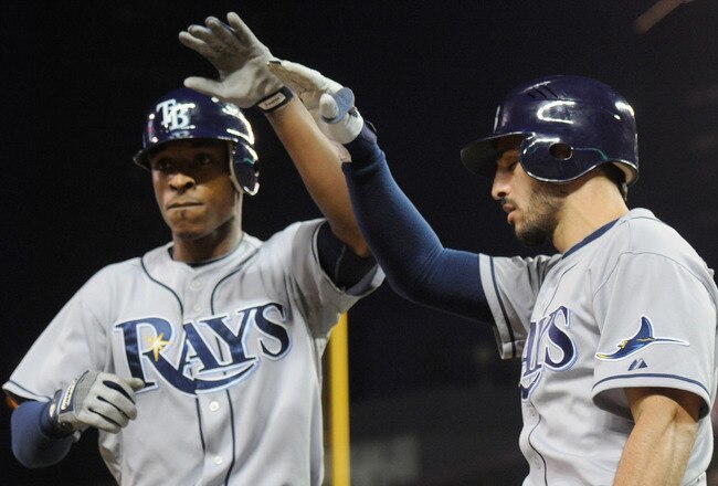 MINNEAPOLIS, MN - JULY 5: B.J. Upton #2 and Sean Rodriguez #1 of the Tampa Bay Rays celebrate a solo home run by Upton against the Minnesota Twins in the ninth inning on July 5, 2011 at Target Field in Minneapolis, Minnesota. The Twins defeated the Rays 3-2. (Photo by Hannah Foslien/Getty Images)