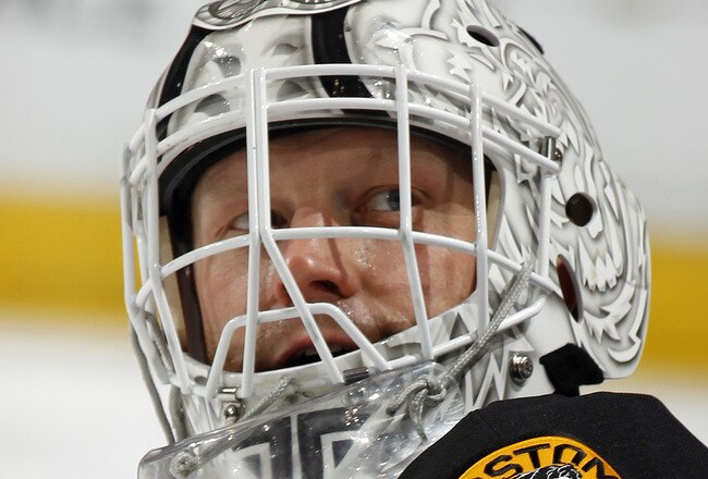 SUNRISE, FL - JANUARY 16: Goaltender Tim Thomas #30 of the Boston Bruins warms up prior to the game against the Florida Panthers on January 16, 2012 at the BankAtlantic Center in Sunrise, Florida.  (Photo by Joel Auerbach/Getty Images)