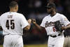 HOUSTON - SEPTEMBER 22:  Pitcher Henry Sosa #65 of the Houston Astros bumps fists with Carlos Lee #45 after Lee hit a three-run double in the third inning against the Colorado Rockie> at Minute Maid Park on September 22, 2011 in Houston, Texas.  (Photo by Bob Levey/Getty Images)