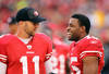 SAN FRANCISCO, CA - NOVEMBER 20:  Alex Smith #11 talks to Michael Crabtree #15 of the San Francisco 49ers on the sidelines during their game against the Arizona Cardinals at Candlestick Park on November 20, 2011 in San Francisco, California.  (Photo by Ezra Shaw/Getty Images)
