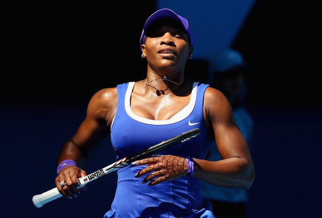MELBOURNE, AUSTRALIA - JANUARY 23:  Serena Williams of the United States of America reacts in her fourth round match against Ekaterina Makarova of Russia during day eight of the 2012 Australian Open at Melbourne Park on January 23, 2012 in Melbourne, Australia.  (Photo by Lucas Dawson/Getty Images)