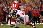 SAN FRANCISCO, CA - JANUARY 22:  Alex Smith #11 of the San Francisco 49ers is sacked by Justin Tuck #91 and Jason Pierre-Paul #90 of the New York Giants in the third quarter during the NFC Championship Game at Candlestick Park on January 22, 2012 in San Francisco, California.  (Photo by Jamie Squire/Getty Images)