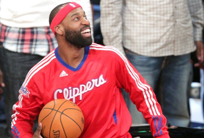 LOS ANGELES, CA - FEBRUARY 19:  NBA player Baron Davis of the L.A. Clippers passes the ball from inside the car to teammate, Blake Griffin, and he attempts a slam dunk, during the Sprite Slam Dunk Contest apart of NBA All-Star Saturday Night at Staples Center on February 19, 2011 in Los Angeles, California. NOTE TO USER: User expressly acknowledges and agrees that, by downloading and or using this photograph, User is consenting to the terms and conditions of the Getty Images License Agreement.  (Photo by Noel Vasquez/Getty Images)