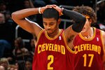 ATLANTA, GA - JANUARY 21:  Kyrie Irving #2 of the Cleveland Cavaliers reacts after a turnover to the Atlanta Hawks at Philips Arena on January 21, 2012 in Atlanta, Georgia.  NOTE TO USER: User expressly acknowledges and agrees that, by downloading and or using this photograph, User is consenting to the terms and conditions of the Getty Images License Agreement.  (Photo by Kevin C. Cox/Getty Images)