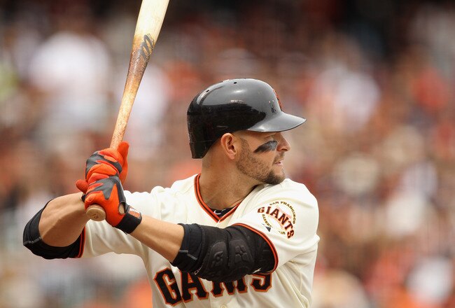 SAN FRANCISCO, CA - JUNE 05:  Cody Ross #13 of the San Francisco Giants bats against the Colorado Rockies at AT&T Park on June 5, 2011 in San Francisco, California.  (Photo by Ezra Shaw/Getty Images)