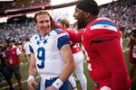 HONOLULU - JANUARY 30:  Drew Brees, #9 of the New Orleans Saints, shares a laugh with Devin McCourty, #32 of the New England Patriots, after the 2011 NFL Pro Bowl at Aloha Stadium on January 30, 2011 in Honolulu, Hawaii. NFC won 55-41 over the AFC. (Photo by Kent Nishimura/Getty Images)