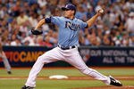 ST PETERSBURG, FL - OCTOBER 04:  Pitcher Matt Moore #55 of the Tampa Bay Rays pitches against the Texas Rangers during Game Four of the American League Division Series at Tropicana Field on October 4, 2011 in St. Petersburg, Florida.  (Photo by J. Meric/Getty Images)