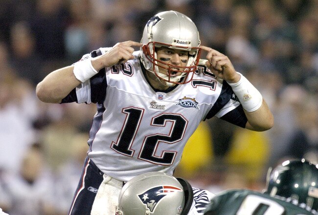 New England Patriots QB Tom Brady #12 makes a call during Super Bowl XXXIX between the Philadelphia Eagles and the New England Patriots at Alltel Stadium in Jacksonville, Florida on February 6, 2005.  (Photo by Al Messerschmidt/Getty Images)