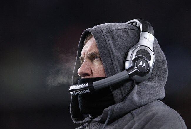 FOXBORO, MA - JANUARY 14:  Head coach Bill Belichick of the New England Patriots looks on against the Denver Broncos during their AFC Divisional Playoff Game at Gillette Stadium on January 14, 2012 in Foxboro, Massachusetts.  (Photo by Elsa/Getty Images)
