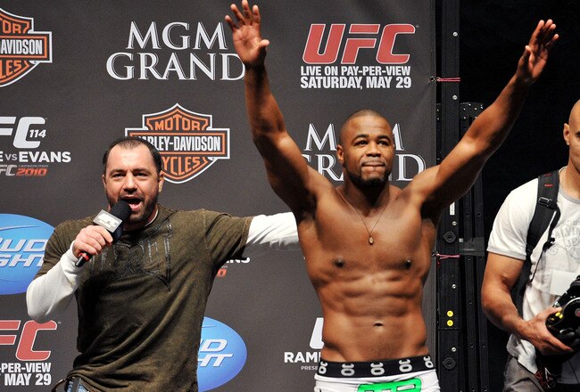 LAS VEGAS - MAY 28:  UFC fighter Rashad Evans (R) reacts to the crowd while speaking to UFC announcer Joe Rogan (L) about his fight against UFC fighter Quinton 'Rampage' Jackson at UFC 114: Rampage versus Rashad at the Mandalay Bay Hotel on May 28, 2010 in Las Vegas, Nevada.  (Photo by Jon Kopaloff/Getty Images)