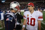 FOXBORO, MA - NOVEMBER 6:    Tom Brady #12 of the New England Patriots congratulates  Eli Manning #10 of the New York Giants after the New York Giants 24-20 win on November 6, 2011 in Foxboro, Massachusetts. (Photo by Jim Rogash/Getty Images)
