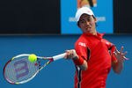 MELBOURNE, AUSTRALIA - JANUARY 21:  Kei Nishikori of Japan plays a forehand in his third round match against Julien Benneteau of France during day six of the 2012 Australian Open at Melbourne Park on January 21, 2012 in Melbourne, Australia.  (Photo by Lucas Dawson/Getty Images)