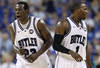HOUSTON, TX - APRIL 02:  Khyle Marshall #23 of the Butler Bulldogs reacts alongside teammate Shelvin Mack #1 in the first half while taking on Virginia Commonwealth Rams during the National Semifinal game of the 2011 NCAA Division I Men's Basketball Championship at Reliant Stadium on April 2, 2011 in Houston, Texas.  (Photo by Andy Lyons/Getty Images)