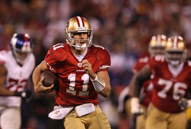 SAN FRANCISCO, CA - JANUARY 22:  Alex Smith #11 of the San Francisco 49ers runs the ball
during the second half of the NFC Championship Game against the New York Giants at Candlestick Park on January 22, 2012 in San Francisco, California.  (Photo by Ezra Shaw/Getty Images)
