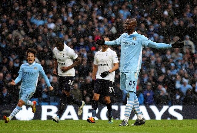 MANCHESTER, ENGLAND - JANUARY 22:  Mario Balotelli of Manchester City celebrates scoring his team's third goal from a penalty during the Barclays Premier League match between Manchester City and Tottenham Hotspur at the Etihad Stadium on January 22, 2012 in Manchester, England.  (Photo by Alex Livesey/Getty Images)